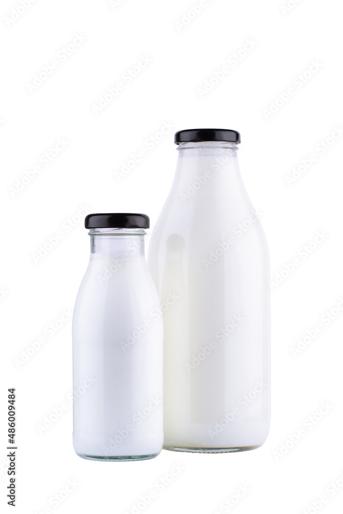 bottles of milk mockup with black cap isolated on white background bottles of milk mockup with black cap isolated on white background