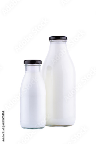 bottles of milk mockup with black cap isolated on white background