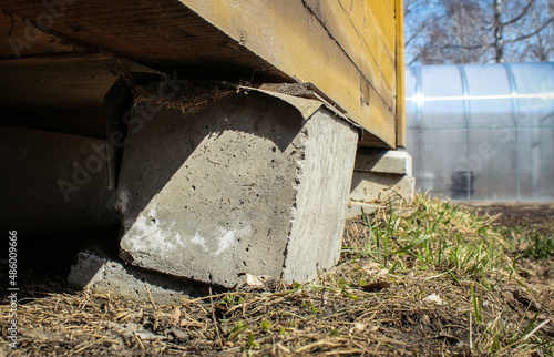 Rickety support of a country house close-up. Selective focus