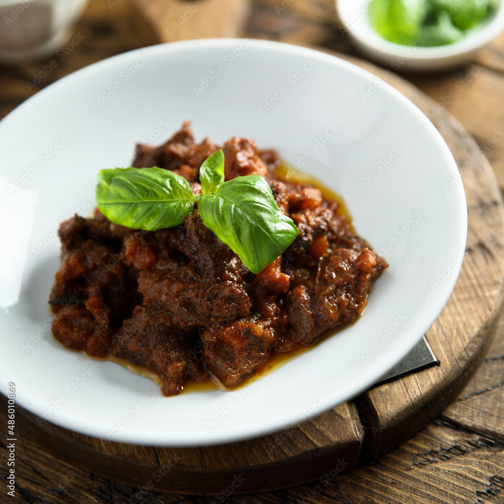 Homemade beef ragout with fresh basil Homemade beef ragout with fresh basil