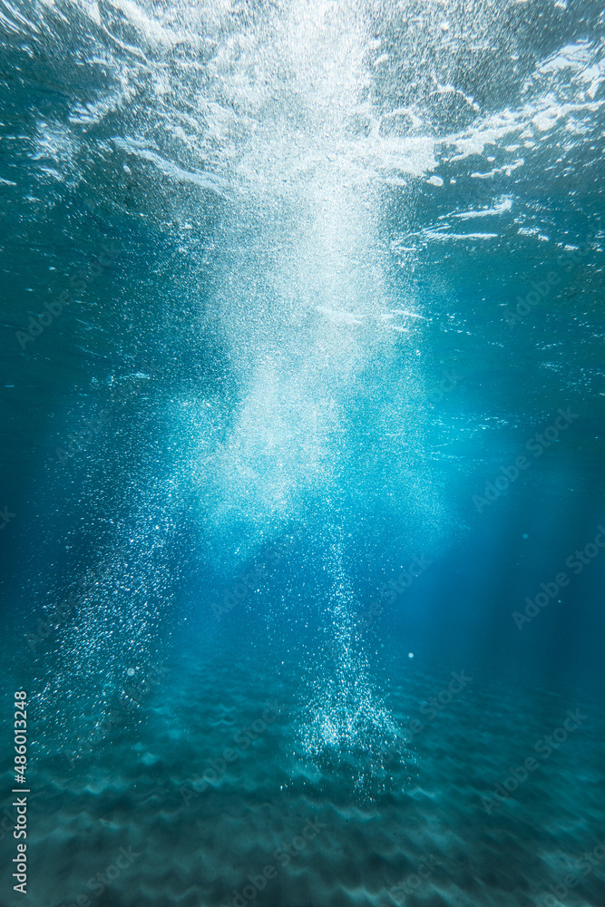 Underwater shiny bubbles in sea