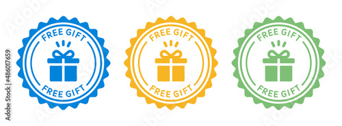 Free gift text on badge stamp in graphic design. Free gift stamp.