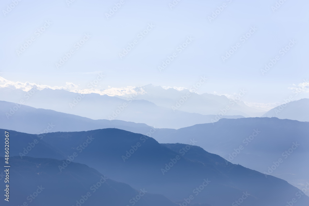 Early morning haze over the mountain ranges of the Dolomites Early morning haze over the mountain ranges of the Dolomites