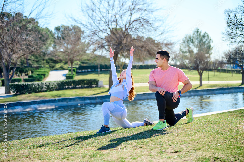Fototapeta premium Young couple practicing sports outdoors