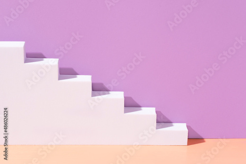 Mockup  background with stairs. Architectural element with bright sunlight and trendy shadows for graphic design  minimalism. Trend of colors 2022   very peri purple and calming coral