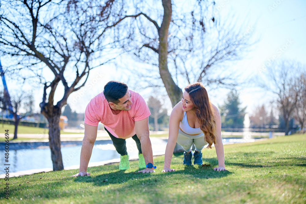 Young couple practicing sports outdoors