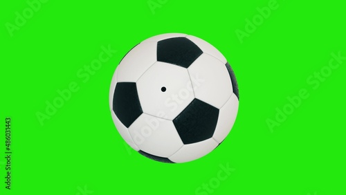 Soccer ball isolated on green background. Sports football. Chroma key background. 3d rendering