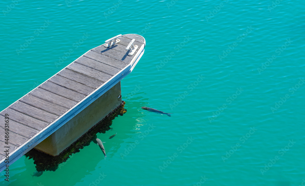 Obraz premium Boat pier in the bay of the city - Cascais, portuguese coast on the Atlantic