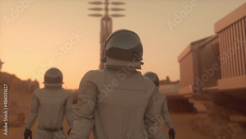 Three astronauts in spacesuits explore the planet Mars. Space Mission. Astronauts travel in space. 3d rendering