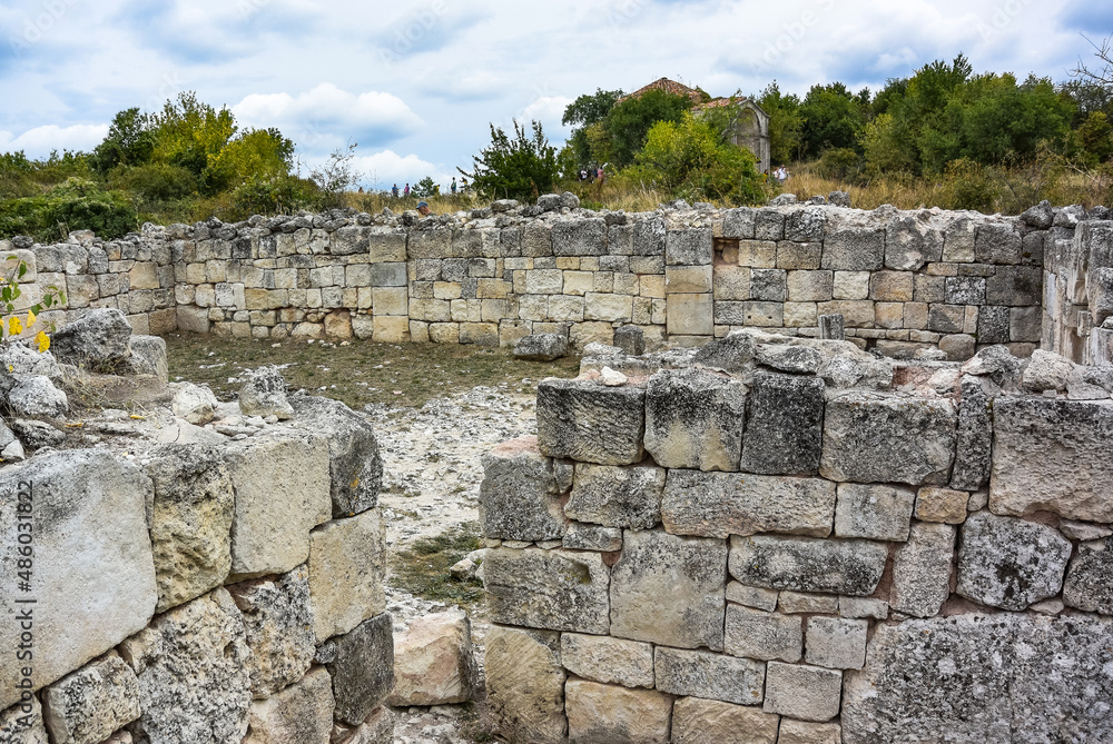 Buildings, buildings and caves of the city of Chufut-Kale, a medieval cave settlement in the Crimea. Cave city. Buildings, buildings and caves of the city of Chufut-Kale, a medieval cave settlement in the Crimea. Cave city.