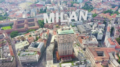 Inscription on video. Milan, Italy. Residential skyscraper in the city center. Roofs of the city aerial view. Glitch effect text, Aerial View, Point of interest photo