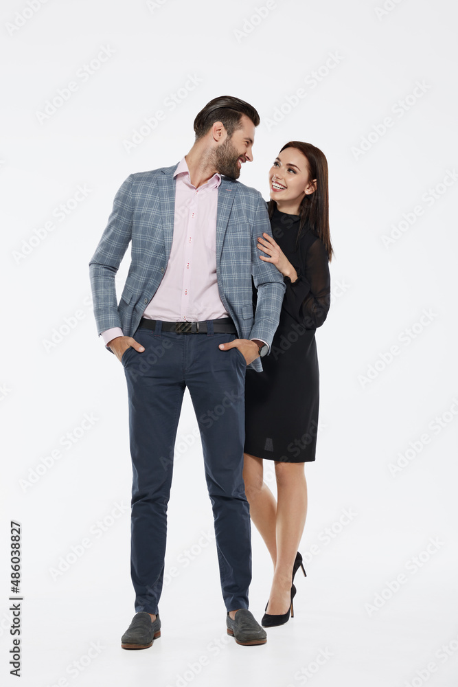 Young couple standing and looking at each other Young couple standing and looking at each other