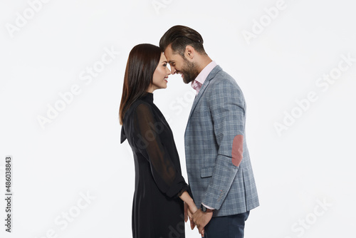 Couple holding hands and looking at each other