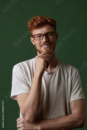 Smiling caucasian red hair guy with crossed arm © Drobot Dean