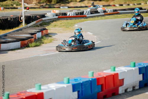 Child in a kart on a kart track. Child goes karting 