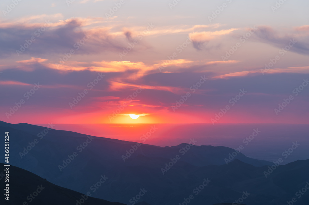 Amazing colorful sunset in the mountains. Mountain landscape.