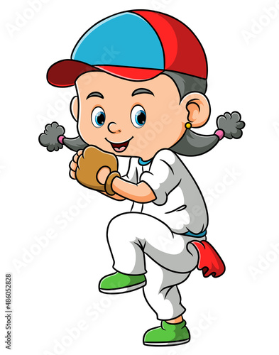 The sporty girl is playing the baseball and ready to throw the ball