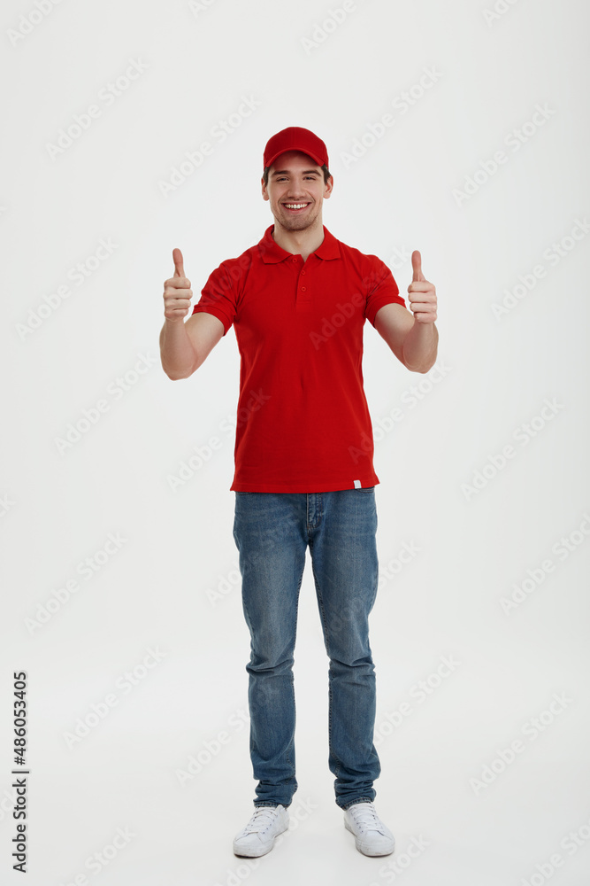 Young male courier on white background in studio Young male courier on white background in studio