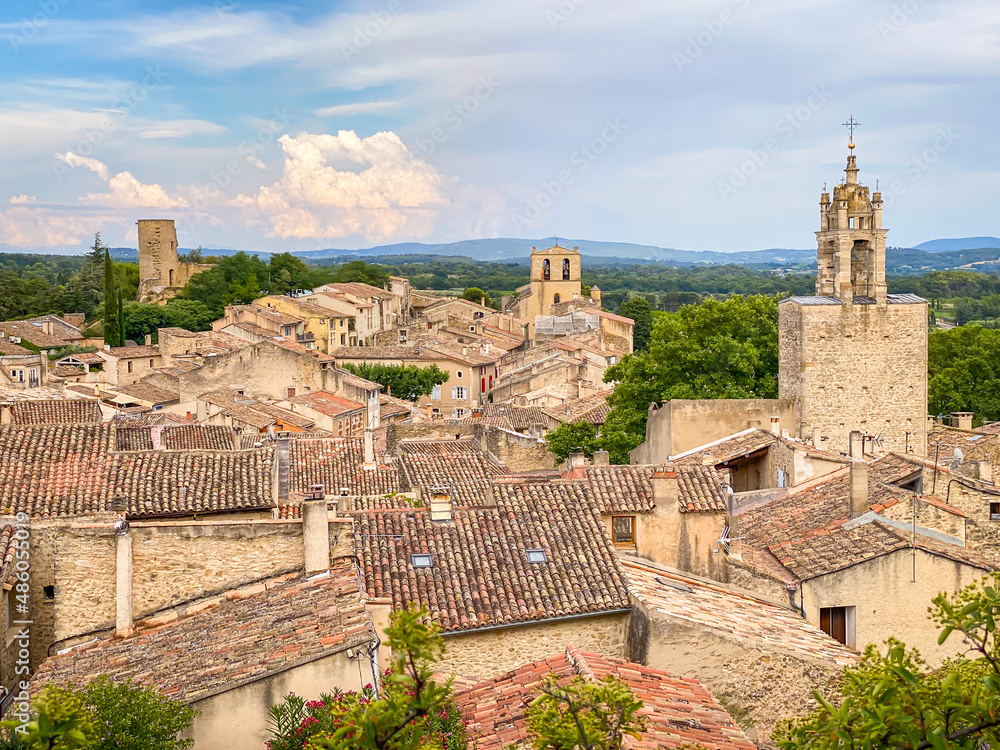 Village of Cucuron in the Luberon valley with a view on the clock tower in Provence, France