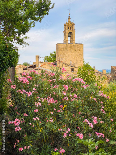 Clock tower of the village of Cucuron in the Luberon valley in Provence, France photo