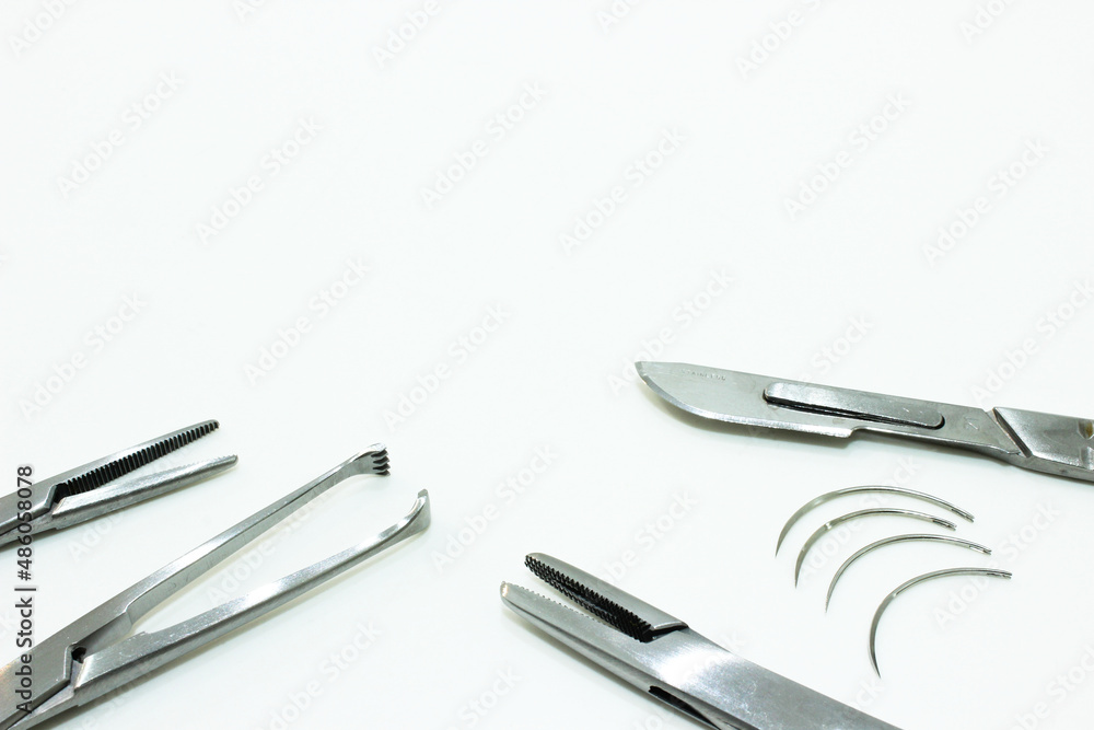 Surgical Instruments Isolated on the White Background Surgical Instruments Isolated on the White Background