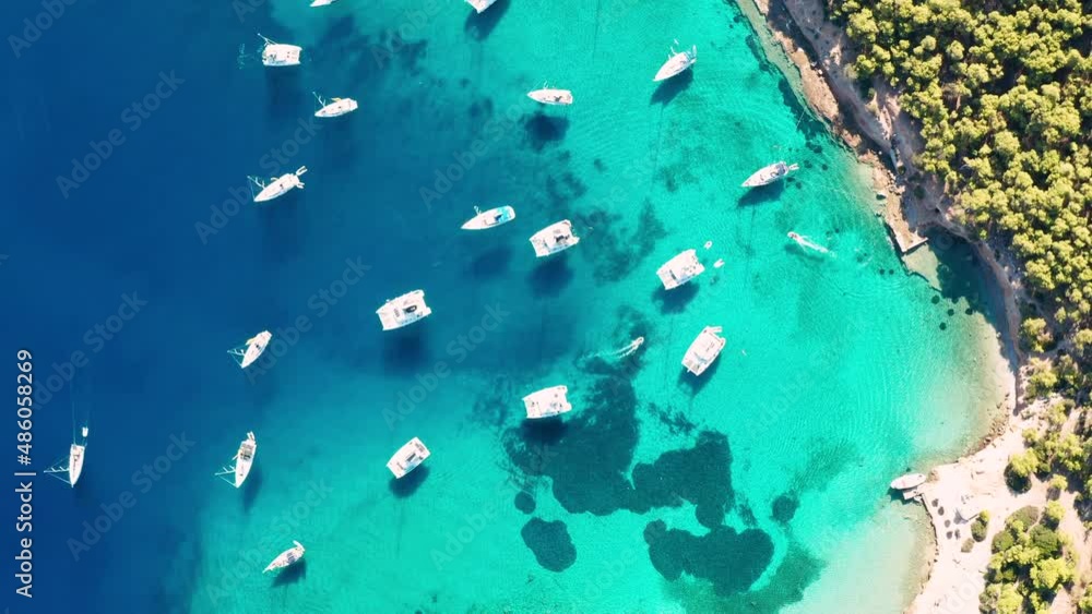 Yacht near the green island in Greece. Luxury vacation at sea. Yacht near the green island in Greece. Luxury vacation at sea.