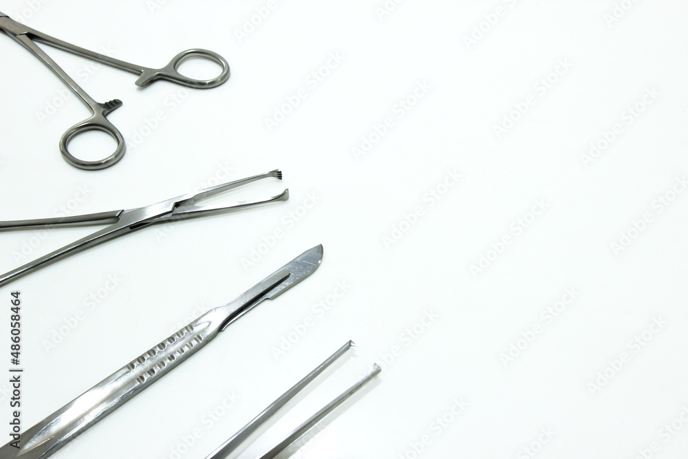 Surgical Instruments Isolated on the White Background Surgical Instruments Isolated on the White Background