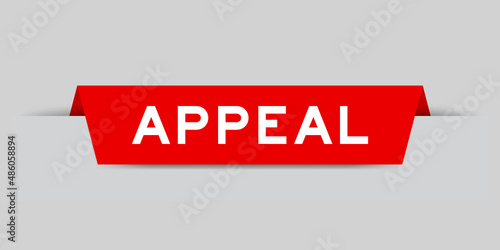 Red color inserted label with word appeal on gray background