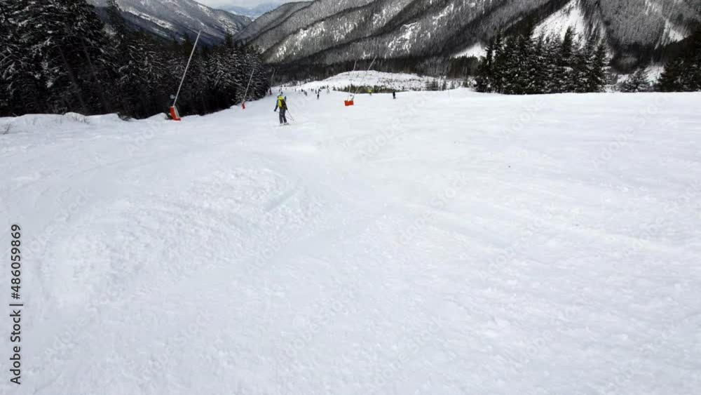 woman skier at ski slope mountains landscape woman skier at ski slope mountains landscape