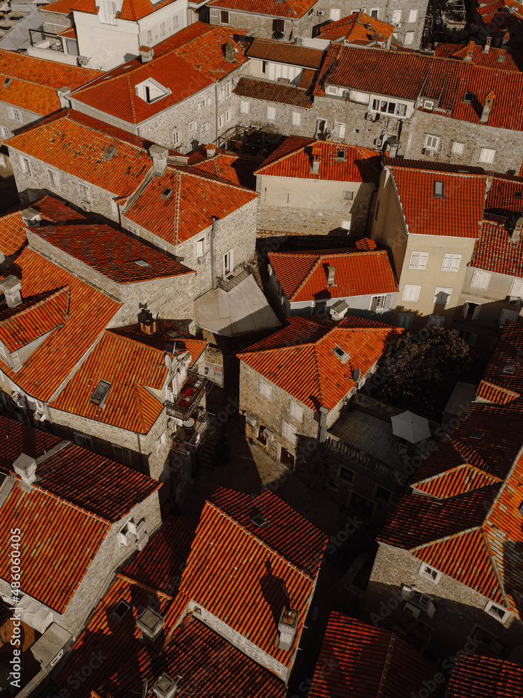 Roofs of the town. Red roof background. Historical part of the european city. Panorama of the city. Explore Montenegro