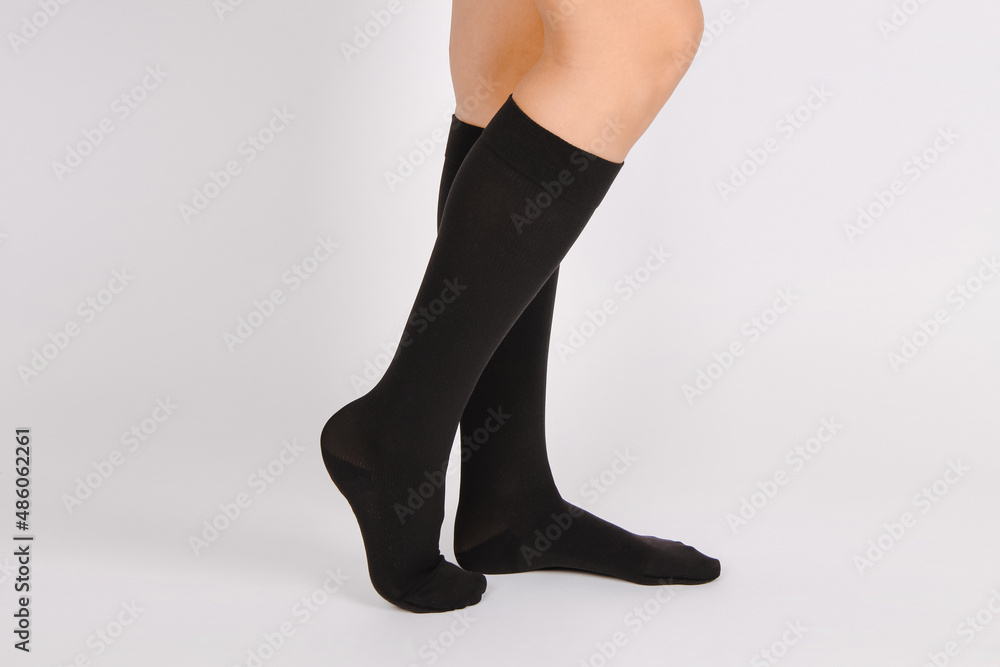 Medical Compression Stockings for varicose veins and venouse therapy.  Compression Hosiery. Sock for sports isolated on white background. Black  color socks mock up for advertising, branding, design. Stock-Foto | Adobe  Stock