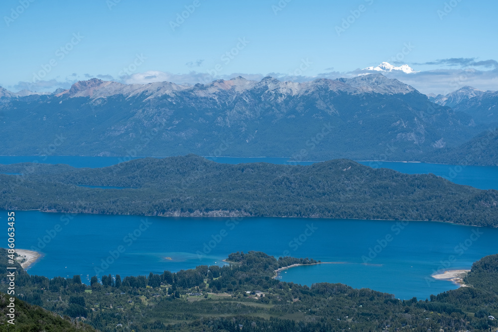 View of the lake in the mountains. Argentine Patagonia. Summer day in nature.	
