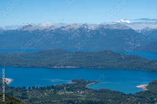 View of the lake in the mountains. Argentine Patagonia. Summer day in nature. 