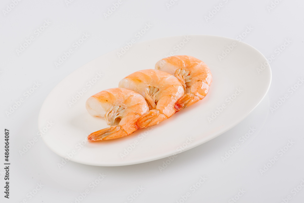 boiled king prawns on a white plate on a white background boiled king prawns on a white plate on a white background