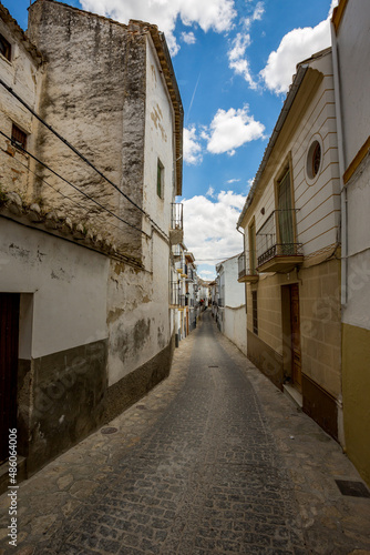 Paved road. Alhama de Granada, Andalusia, Spain. Beautiful and interesting travel destination in the warm Southern region. Public street view. © lightcaptured