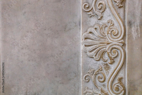 ornament on white marble. background texture