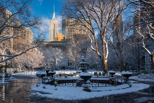 New York City Madison Square Park in winter with view of skyscrapers. Flatiron District of Manhattan