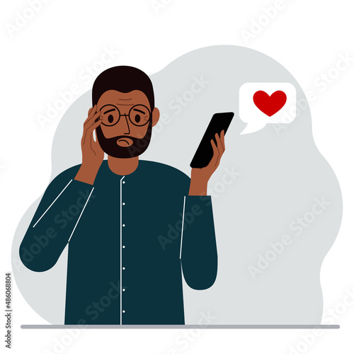 A sad man reads a message on his mobile phone. Message with red heart. Vector