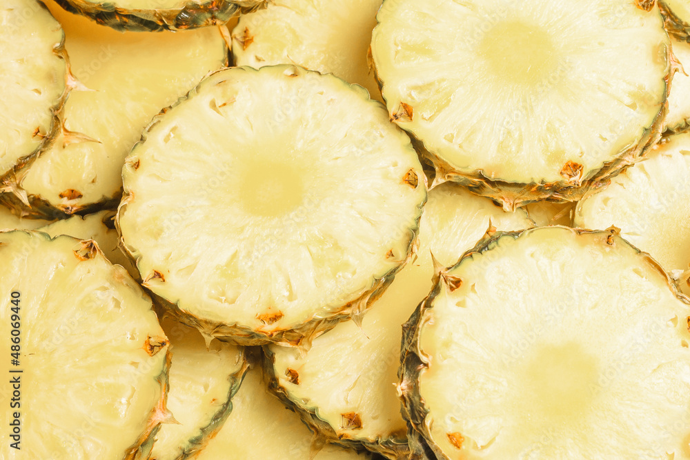 Pineapple juicy yellow slices background. Top view. Pineapple juicy yellow slices background. Top view.
