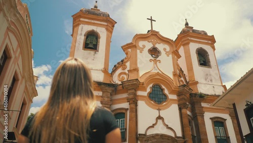 Woman visiting the Nossa Senhora do Pilar Minor Basilica in Ouro Preto, Minas Gerais photo