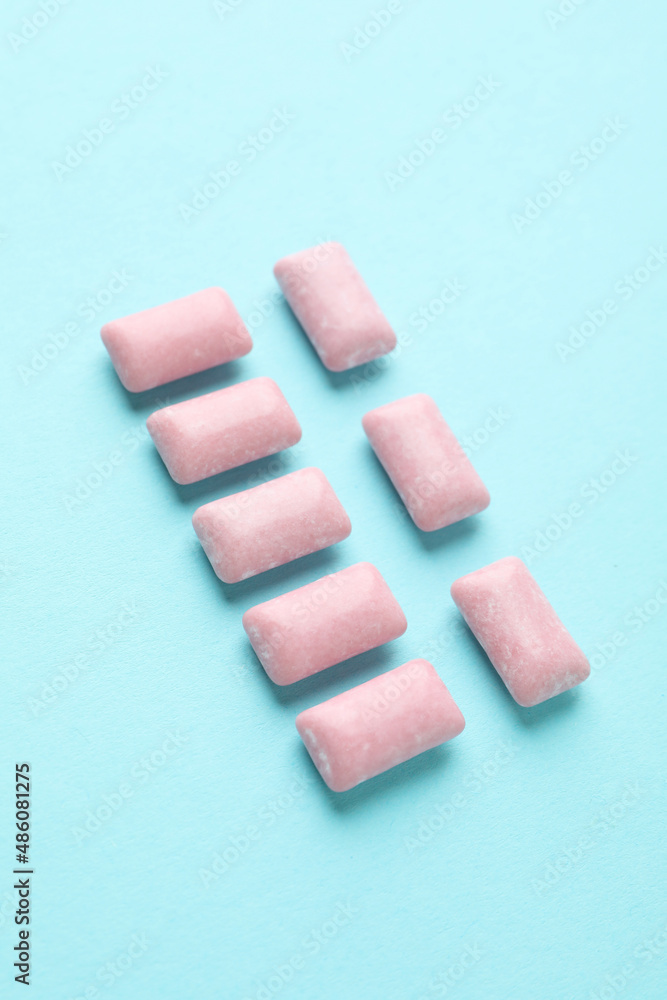 Chewing or bubble gum on blue background Chewing or bubble gum on blue background