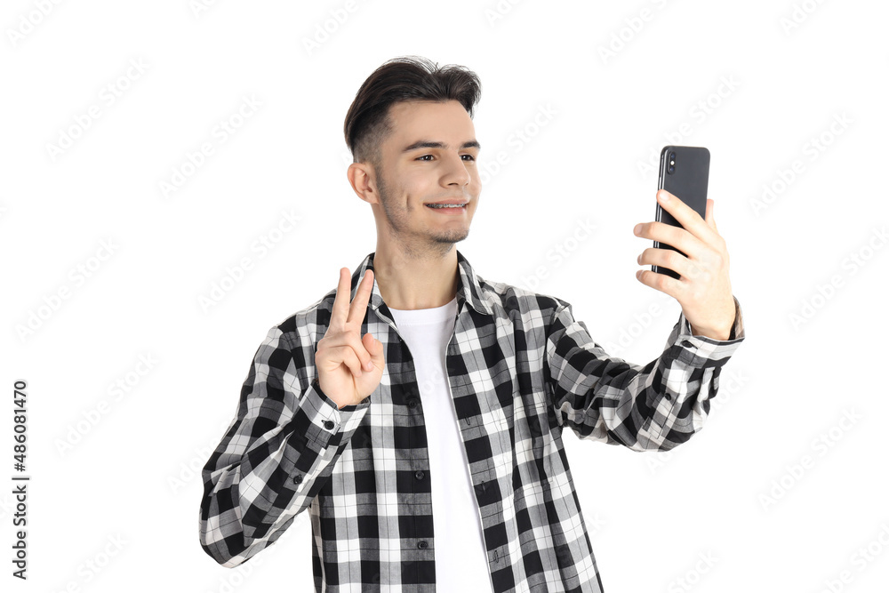 Guy in shirt with phone isolated on white background Guy in shirt with phone isolated on white background