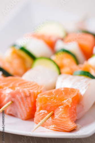 Raw Fish skewers on a Plate. High quality photo