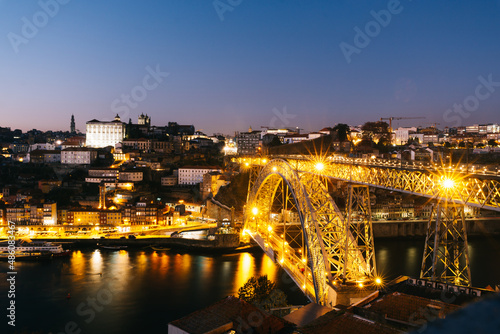 View of the city of Porto with the Don Luis bridge illuminated. © Jenni Ventura Martil