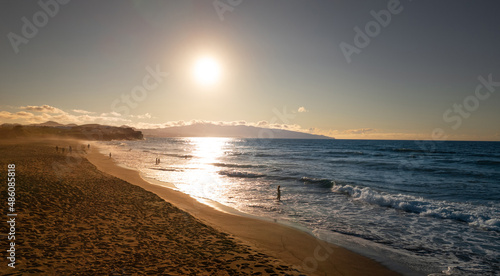 Scenic view of seashore in sunset