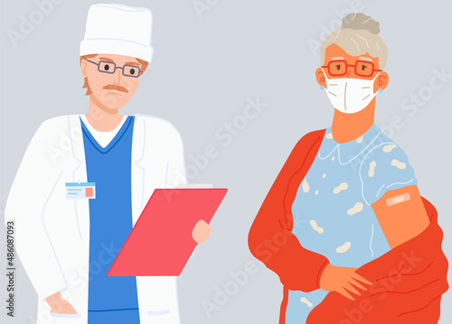 Elderly woman wearing protective medical mask showing her arm with bandage after receiving covid-19 vaccine standing with doctor. Concept of vaccination, health, healthcare, fight against coronavirus