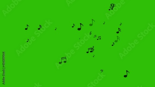 Musical symbols and notes appearing and disappearing with a blur. Smooth animation of black notes and treble clef on Alpha channel. Music background. Template for music video clip or compositions. 4K