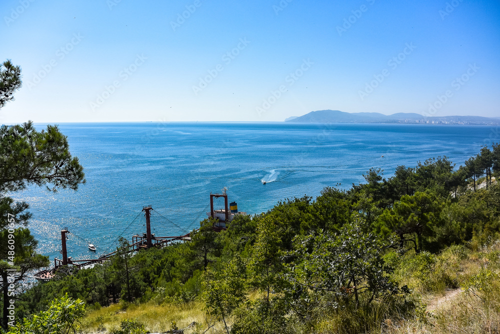 Kabardinka, Krasnodar Krai, Russia - August 2019: Cargo ships in the Black Sea. Russia. Kabardinka, Krasnodar Krai, Russia - August 2019: Cargo ships in the Black Sea. Russia.