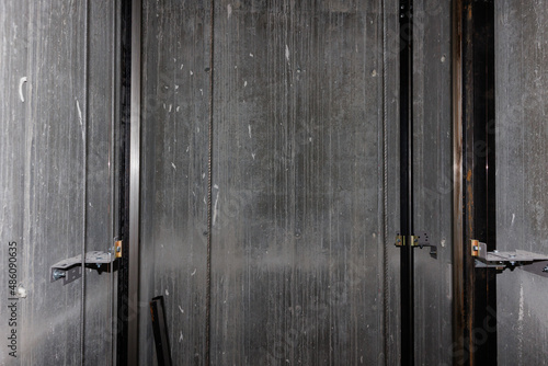 steel rails of the elevator shaft from the inside.