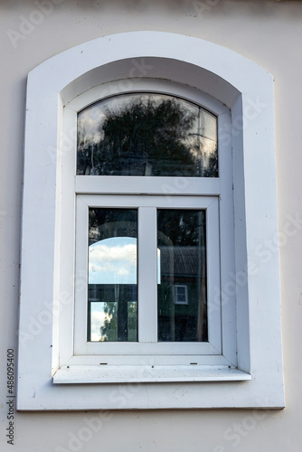 window with carved platbands